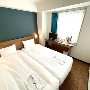 Kleine Kamer met Twee Aparte Bedden